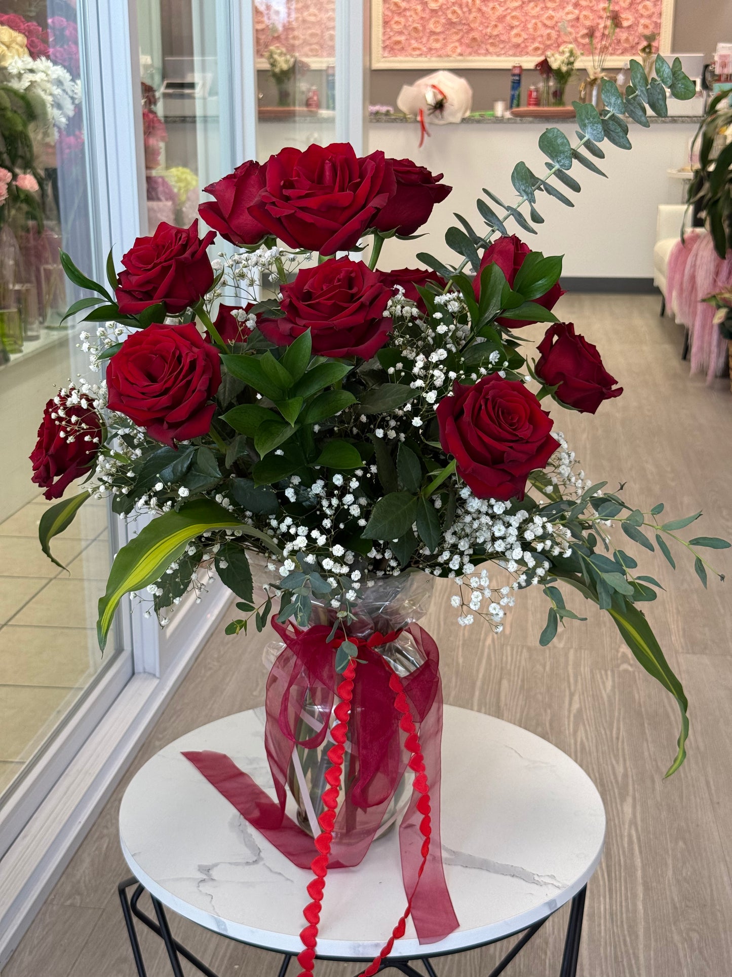 Vase with dozen roses